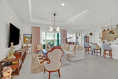 This stunning corner-lot home offers breathtaking lake views and - photo 5