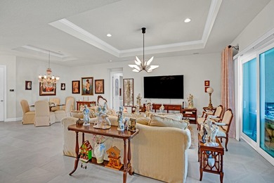 This stunning corner-lot home offers breathtaking lake views and - photo 9