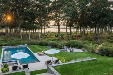 Set on the tranquil shores of Genet Creek, this modern - photo 1