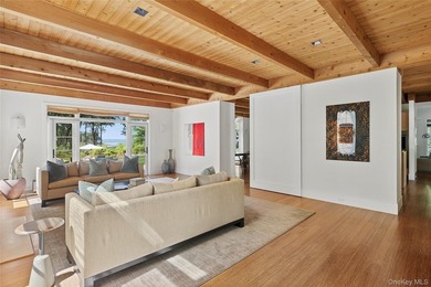 Set on the tranquil shores of Genet Creek, this modern - photo 8