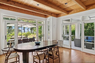 Set on the tranquil shores of Genet Creek, this modern - photo 10