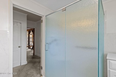 Embrace the warmth and character of this inviting three-bedroom - photo 12