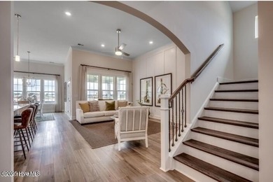 The Fullerton is a two-story Craftsman-style home offering three - photo 3