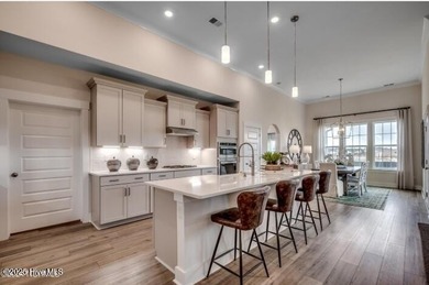 The Fullerton is a two-story Craftsman-style home offering three - photo 4