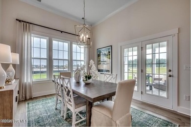 The Fullerton is a two-story Craftsman-style home offering three - photo 10