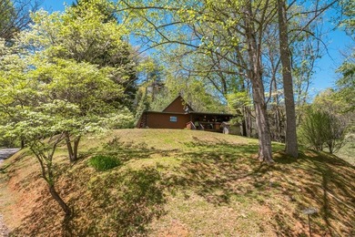 Set on 27.4 acres of rolling pasture and mountain-view land, 440 - photo 11