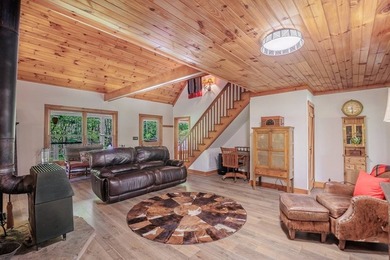 Set on 27.4 acres of rolling pasture and mountain-view land, 440 - photo 18