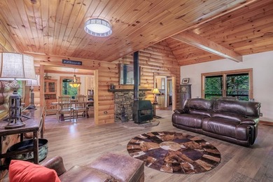 Set on 27.4 acres of rolling pasture and mountain-view land, 440 - photo 19