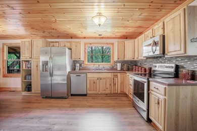 Set on 27.4 acres of rolling pasture and mountain-view land, 440 - photo 21