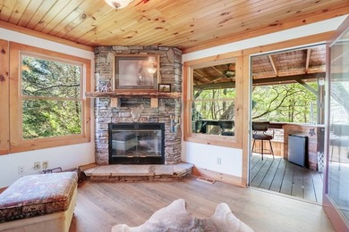 Set on 27.4 acres of rolling pasture and mountain-view land, 440 - photo 26