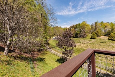 Set on 27.4 acres of rolling pasture and mountain-view land, 440 - photo 35