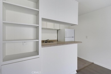 Don't miss this ground level studio condo with inside view of - photo 11