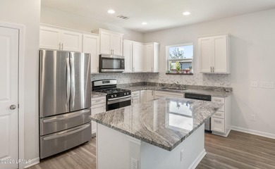Welcome to 1 Toxaway Lane, where modern comfort meets Lowcountry - photo 13