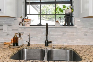 Welcome to this beautiful custom home built in 2021, located in - photo 10