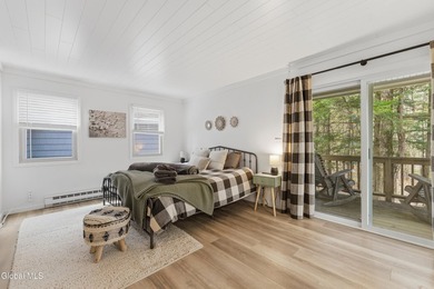 Set on 10+ acres with a beautiful view of Lake George, this - photo 14