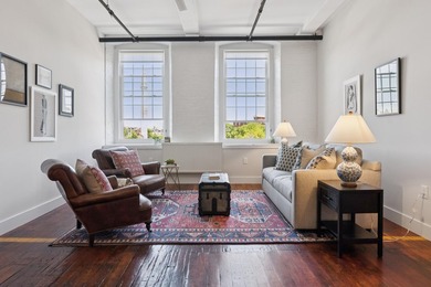 Welcome home to this spacious two bedroom condo overlooking the - photo 1