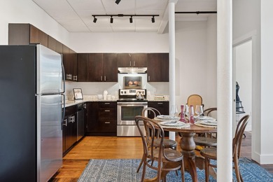 Welcome home to this spacious two bedroom condo overlooking the - photo 2
