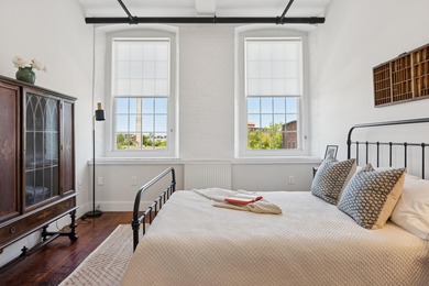 Welcome home to this spacious two bedroom condo overlooking the - photo 3