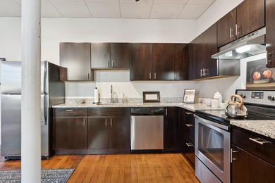 Welcome home to this spacious two bedroom condo overlooking the - photo 5