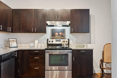 Welcome home to this spacious two bedroom condo overlooking the - photo 6