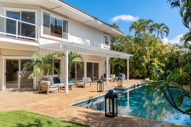 Located in the desirable gated community of Wailea Kialoa, this - photo 14