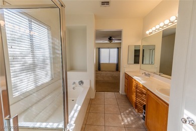 Welcome to your dream one story home in a serene, gated