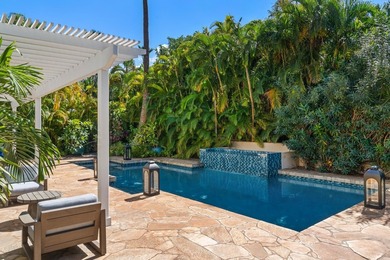 Located in the desirable gated community of Wailea Kialoa, this - photo 15