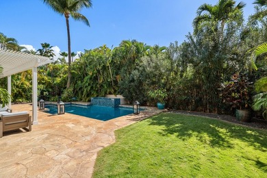 Located in the desirable gated community of Wailea Kialoa, this - photo 16