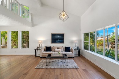 Located in the desirable gated community of Wailea Kialoa, this - photo 17