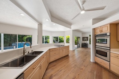 Located in the desirable gated community of Wailea Kialoa, this - photo 22