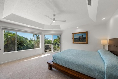 Located in the desirable gated community of Wailea Kialoa, this - photo 23