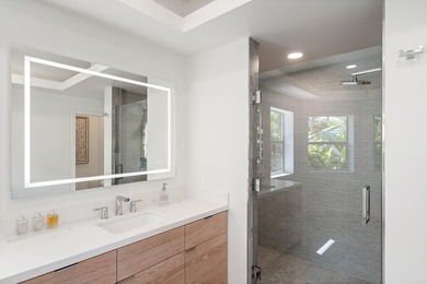 Located in the desirable gated community of Wailea Kialoa, this - photo 26