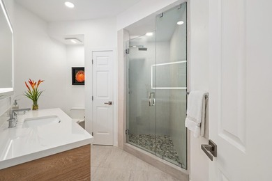 Located in the desirable gated community of Wailea Kialoa, this - photo 32