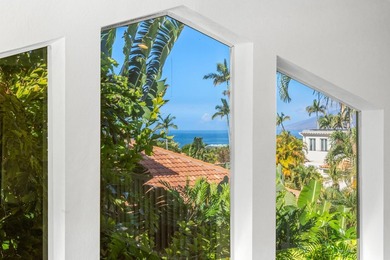 Located in the desirable gated community of Wailea Kialoa, this - photo 36