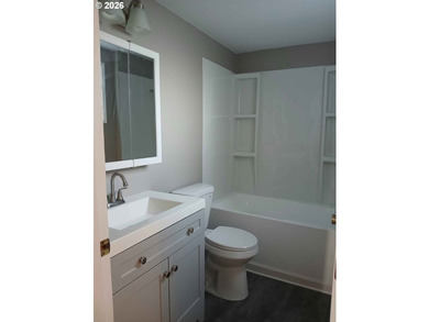 Completely renovated single-level coastal retreat with dual - photo 37