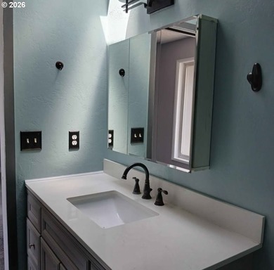 Completely renovated single-level coastal retreat with dual - photo 38