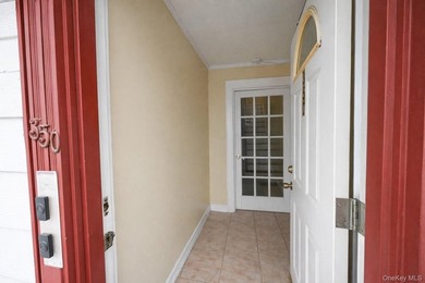 MOVE RIGHT INTO THIS WELL MAINTAINED 2 FAMILY SEMI-ATTACHED HOME - photo 3