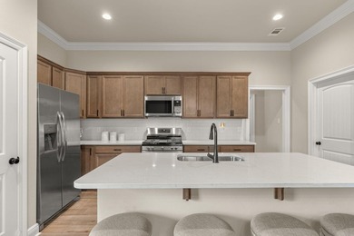 Welcome to 160 Hydrangea Boulevard in the desirable Bluffs at - photo 11