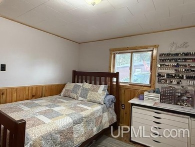 Experience true Northwoods living with this charming waterfront - photo 12