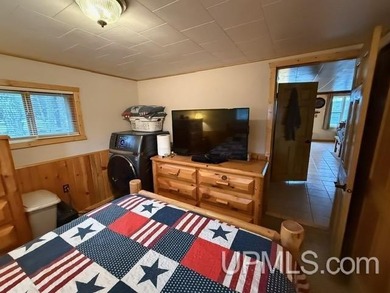 Experience true Northwoods living with this charming waterfront - photo 16