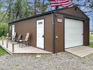 Experience true Northwoods living with this charming waterfront - photo 20