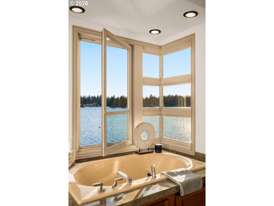 One of Oswego Lake's iconic waterfront homes, this custom estate - photo 24