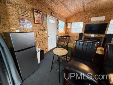 Experience true Northwoods living with this charming waterfront - photo 24