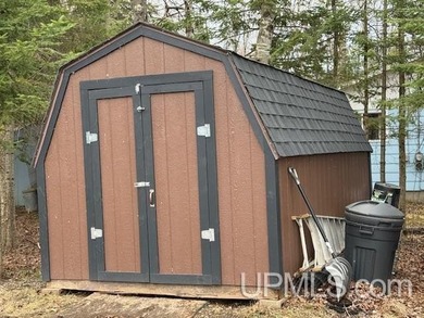 Experience true Northwoods living with this charming waterfront - photo 26