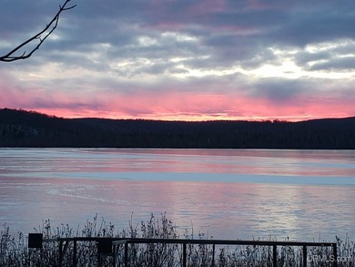 Experience true Northwoods living with this charming waterfront - photo 31