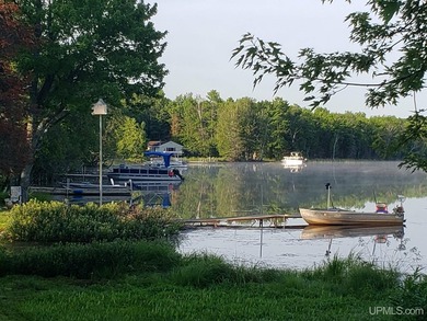 Experience true Northwoods living with this charming waterfront - photo 32
