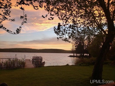 Experience true Northwoods living with this charming waterfront - photo 34