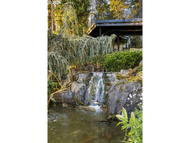 One of Oswego Lake's iconic waterfront homes, this custom estate - photo 40