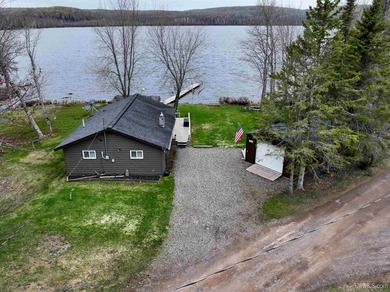 Experience true Northwoods living with this charming waterfront - photo 40