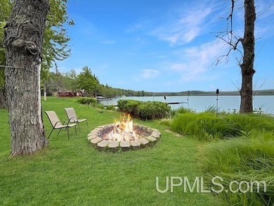 Experience true Northwoods living with this charming waterfront - photo 42
